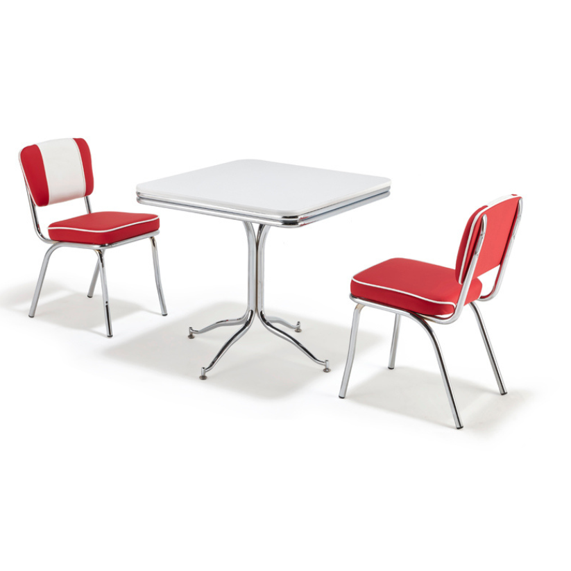 Sitzgruppe mit zwei Retro Stühlem in rot-weißem Kunstlederbezug und Chromgestell. American Dinertisch, abgerundeter Chromkante und Chromfuß und weißer Tischplatte.