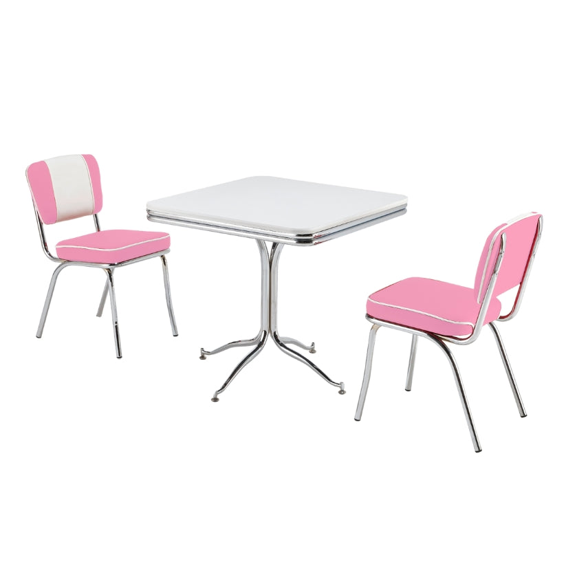 Sitzgruppe mit vier Retro Stühlem in rosa-weißem Kunstlederbezug und Chromgestell. American Dinertisch, abgerundeter Chromkante und Chromfuß weißer Tischplatte.